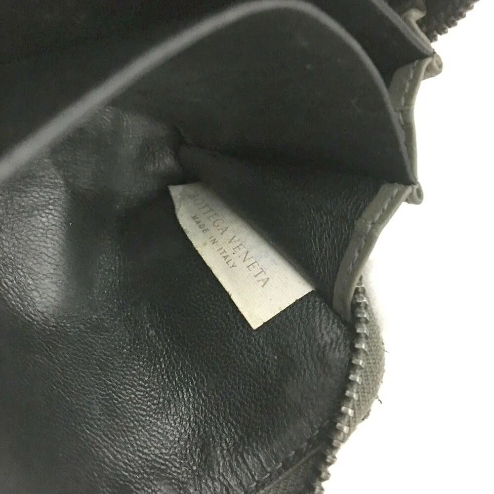 Bottega Veneta, grey intrecciato leather wallet with three compartments and a zip around style!