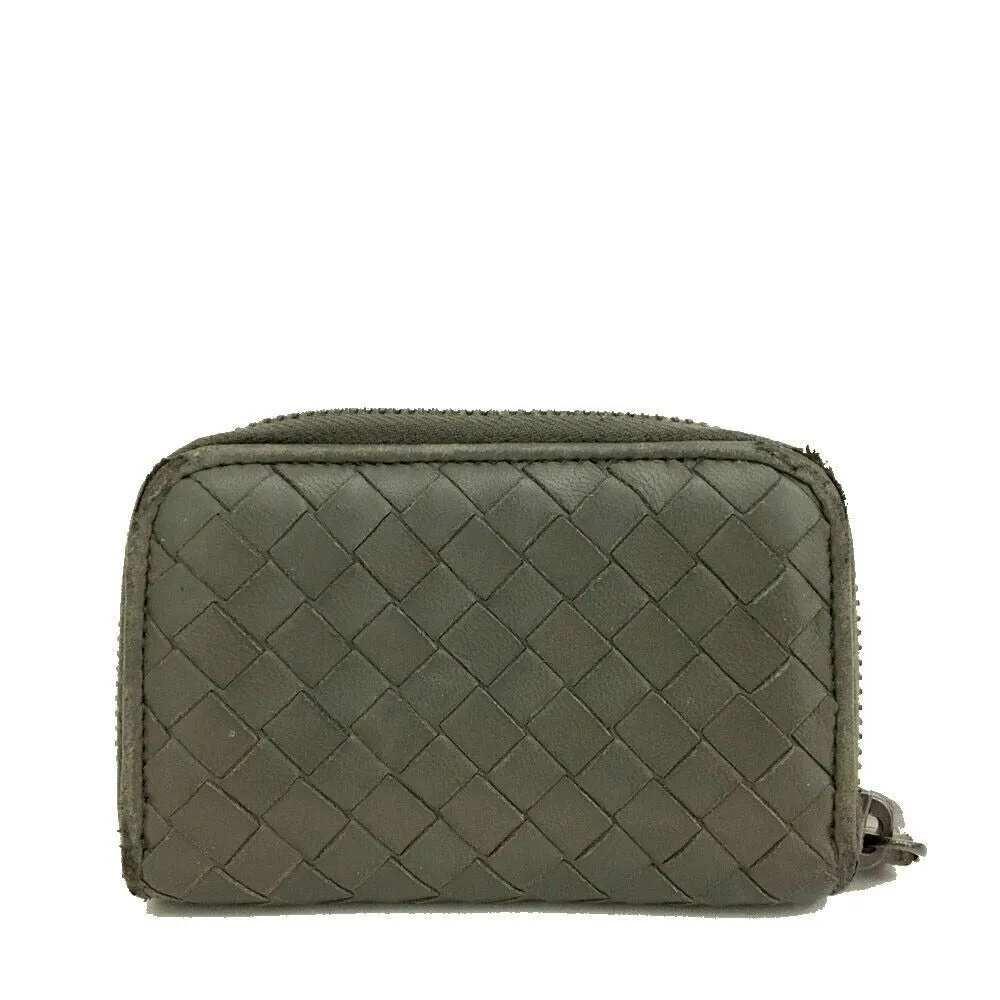 Bottega Veneta, grey intrecciato leather wallet with three compartments and a zip around style!